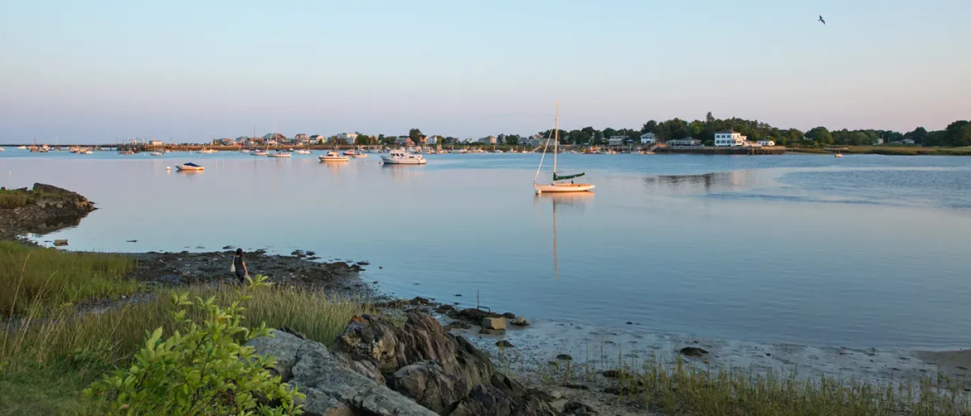 A view of a boat in the ocean off the Biddeford Campus